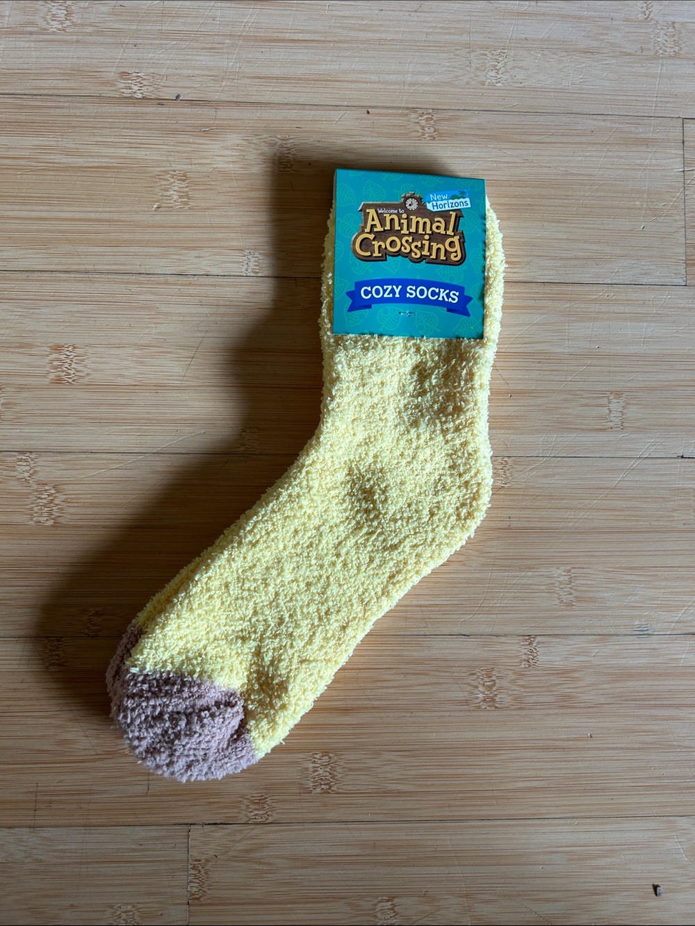 Nintendo Animal Crossing Cozy Yellow Fuzzy Socks with Brown Toe
